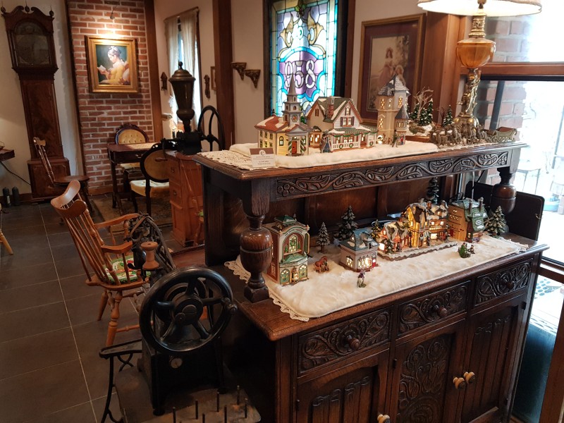 Antique furniture and miniature village display