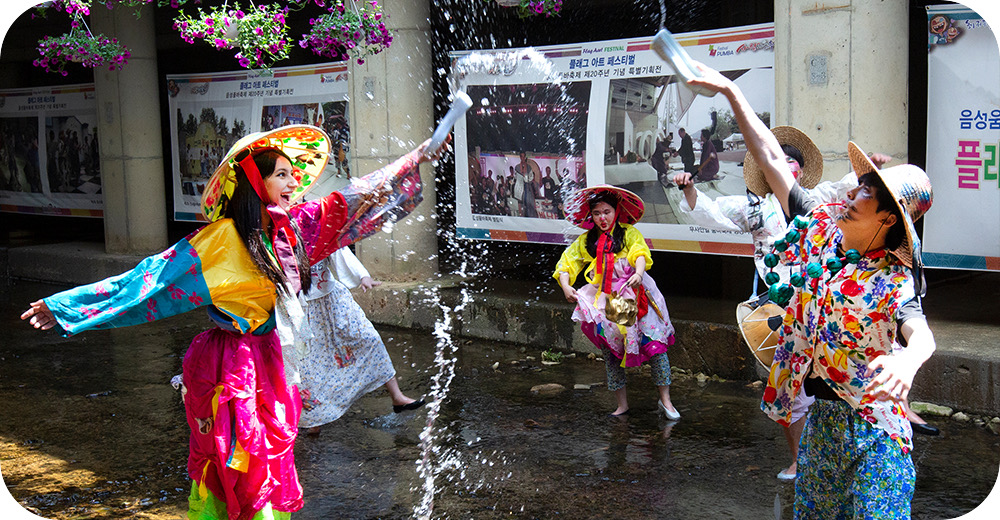 Festival water fight in pumba costume