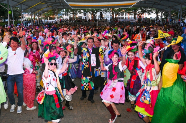 Crowd dancing together at the festival square