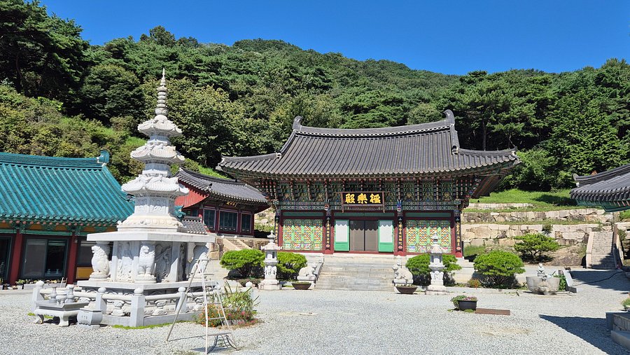 Mitasa temple courtyard with stone pagoda and main hall